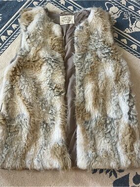 gray brown and white faux fur vest jacket.